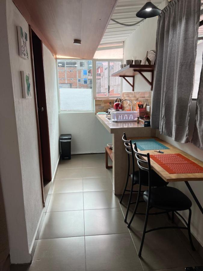 Tiny Apartment In The City Rooftop Terrace Banos  Exterior photo